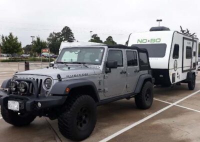 jeep pulling travel trailer